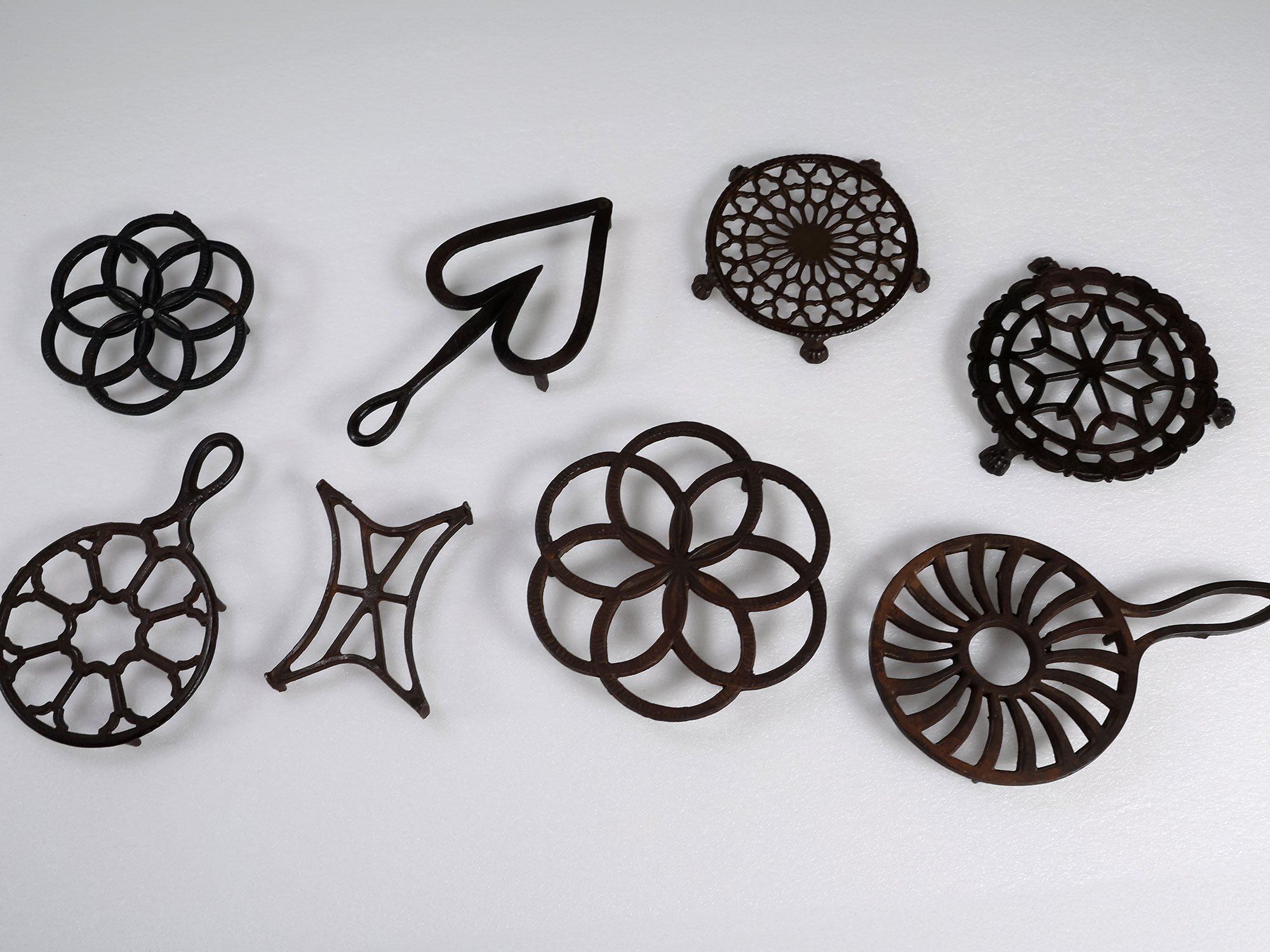 Wrought iron and cast iron trivets, Mrs. William Rockwood American Collection